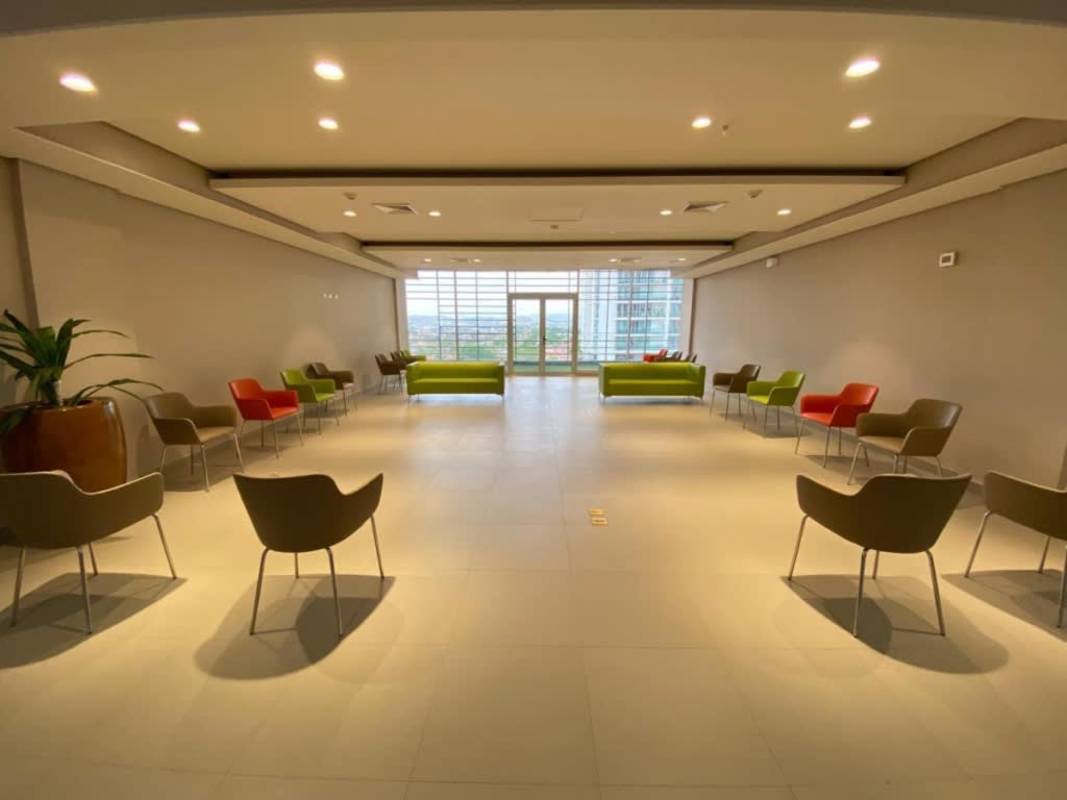 Spacious bright lobby with colorful seating and large windows at Torre Costa Medical Center Panama