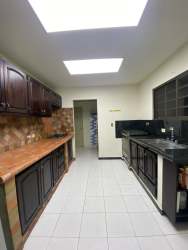 Spacious kitchen with granite countertops cabinetry Aguadulce Villas del Sol