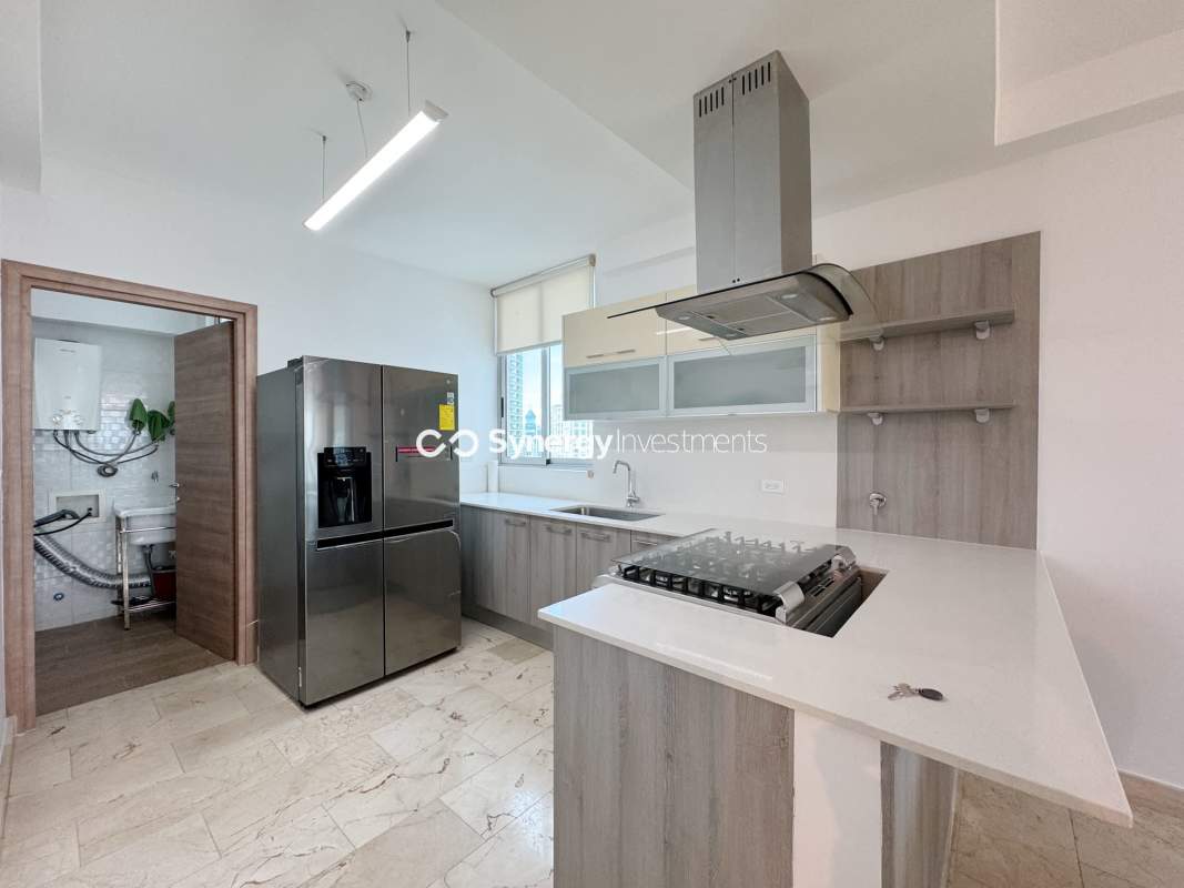 Modern sleek lobby entrance with designer ceiling glass walls sofas PH Dynasty Residences Bella Vista Panama