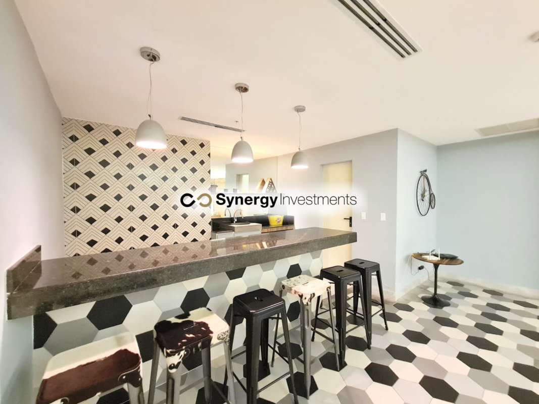 Contemporary kitchen bar with pendant lights granite countertop geometric wall PH Dynasty Residences