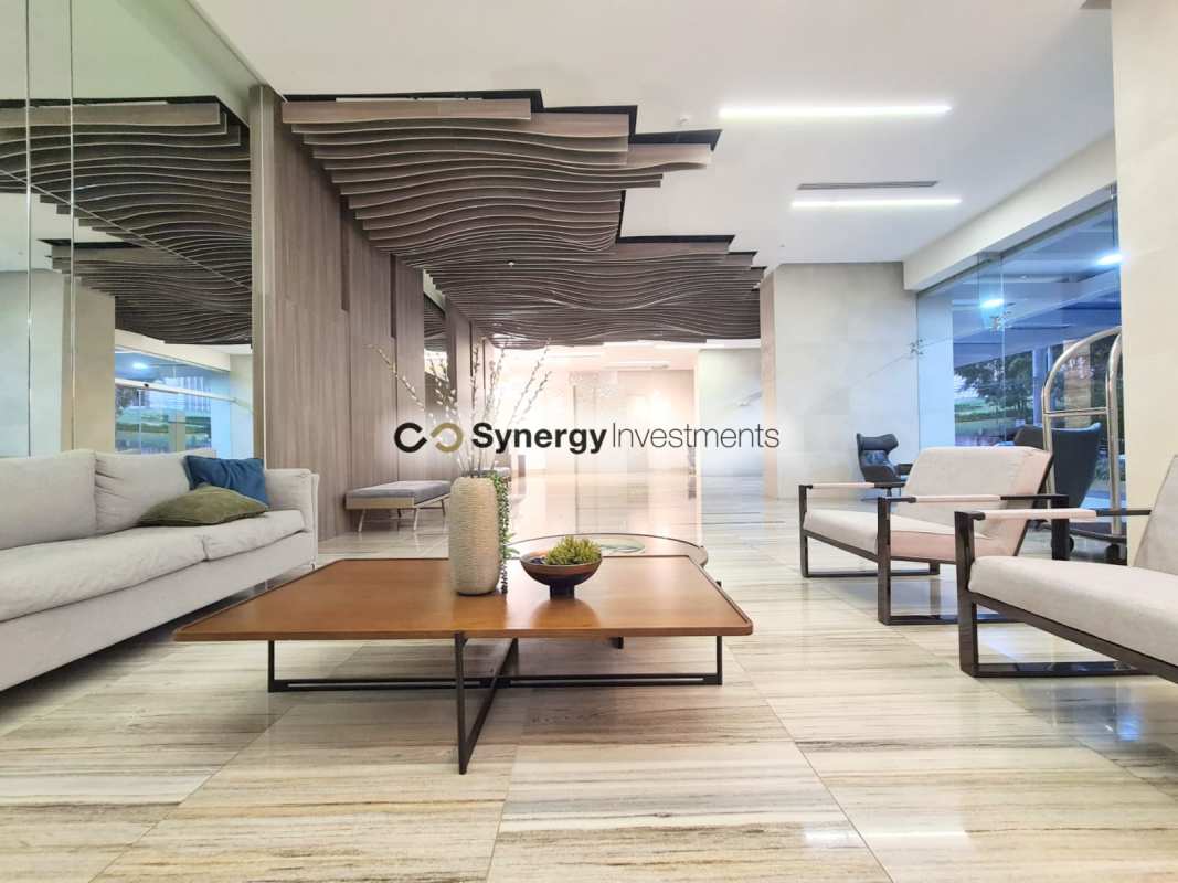 Contemporary outdoor terrace with seating area plants elevator lobby PH Dynasty Residences Bella Vista Panama