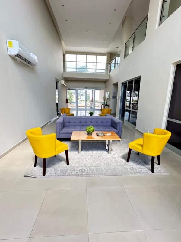 Spacious bedroom with modern built-in wardrobe and natural lighting Villasur Costa Sur Panama