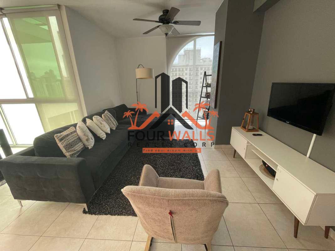 Dining area featuring glass-top table, city views, large windows, PH The Seawaves