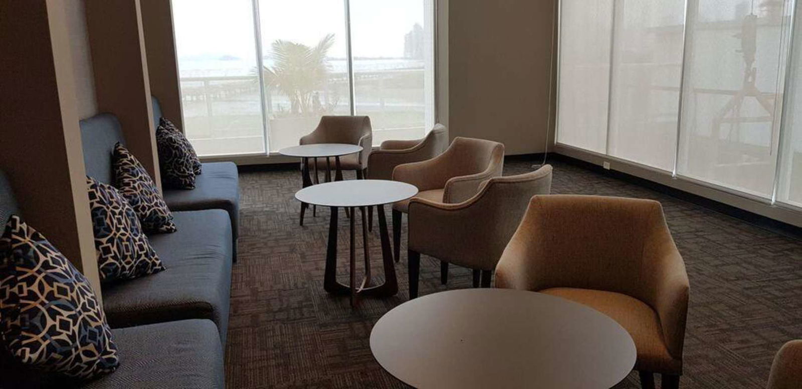 Elegant lobby lounge with concierge reception PH Metropolitan One Costa del Este