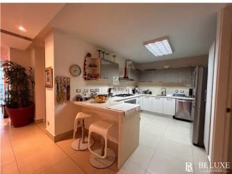 Spacious living dining room with ocean view and balcony access PH Bahía Playa Serena Panama