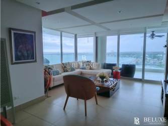 Master bedroom with large windows ocean view balcony access PH Bahía Playa Serena Panama