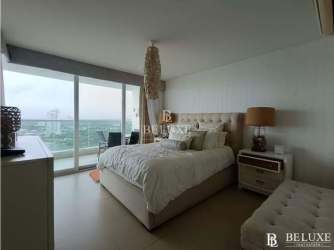 Contemporary kitchen with granite counters breakfast bar stainless appliances PH Bahía Playa Serena