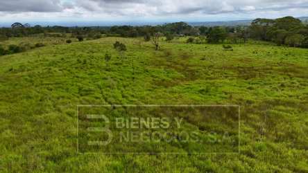 Large rural agricultural property aerial with mountain views and open pastures Santa Rita Chiriquí Panama