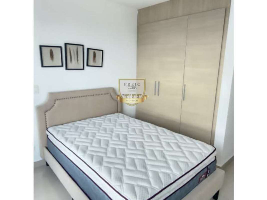 Furnished master bedroom with upholstered bed, wardrobe PH Titanium Costa del Este Panama