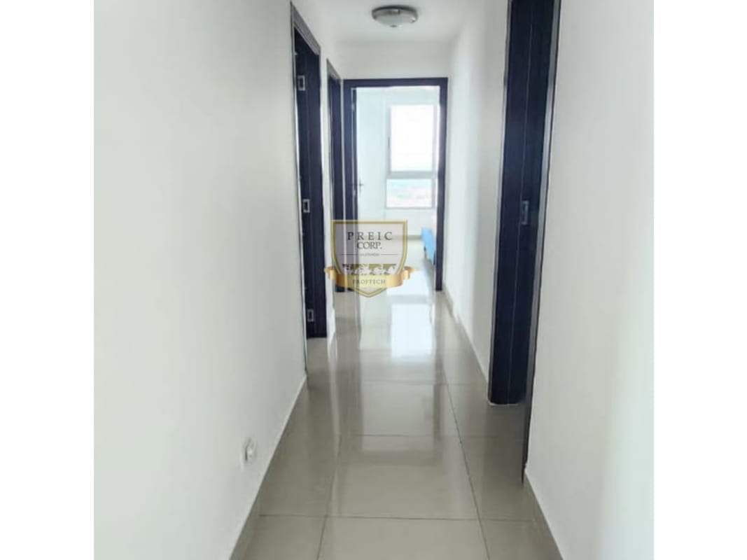 Laundry area with washer dryer and maid's room in Costa del Este apartment Panama