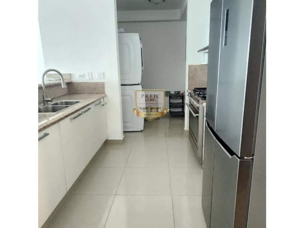 Bright bedroom with tile flooring, glass door to balcony, wall TV mount PH Titanium Costa del Este Panama