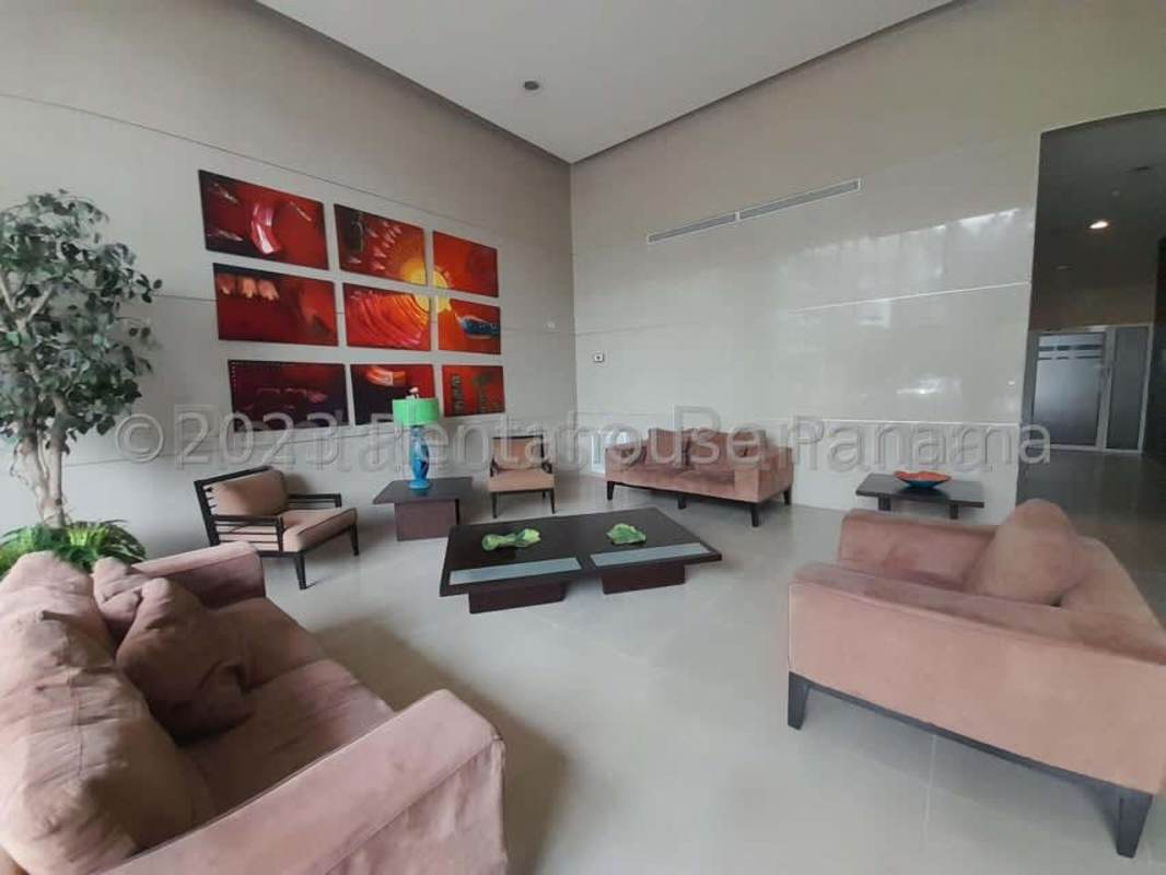 Modern lobby with seating area and concierge desk in PH Miramar high-rise Bella Vista Panama