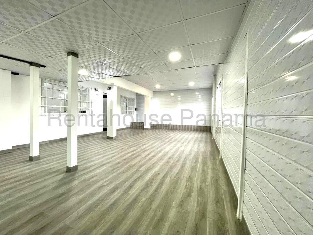 Bathroom with blue fixtures granite countertop and corner shower Altos de Santa María Panama