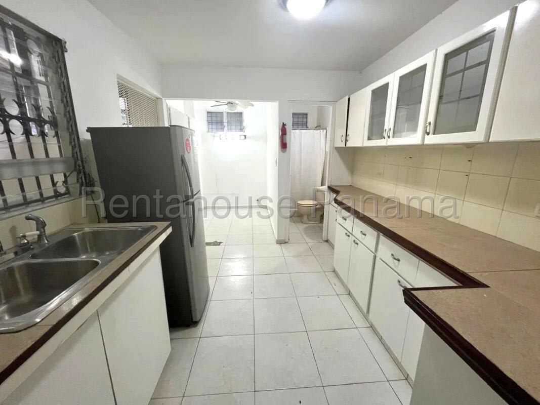 Traditional bright kitchen with ample cabinets and appliances in Altos de Santa María Panama