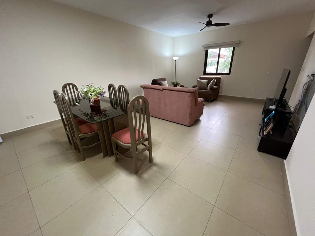 Open living dining room with large window ceramic floors in Embassy Village Clayton