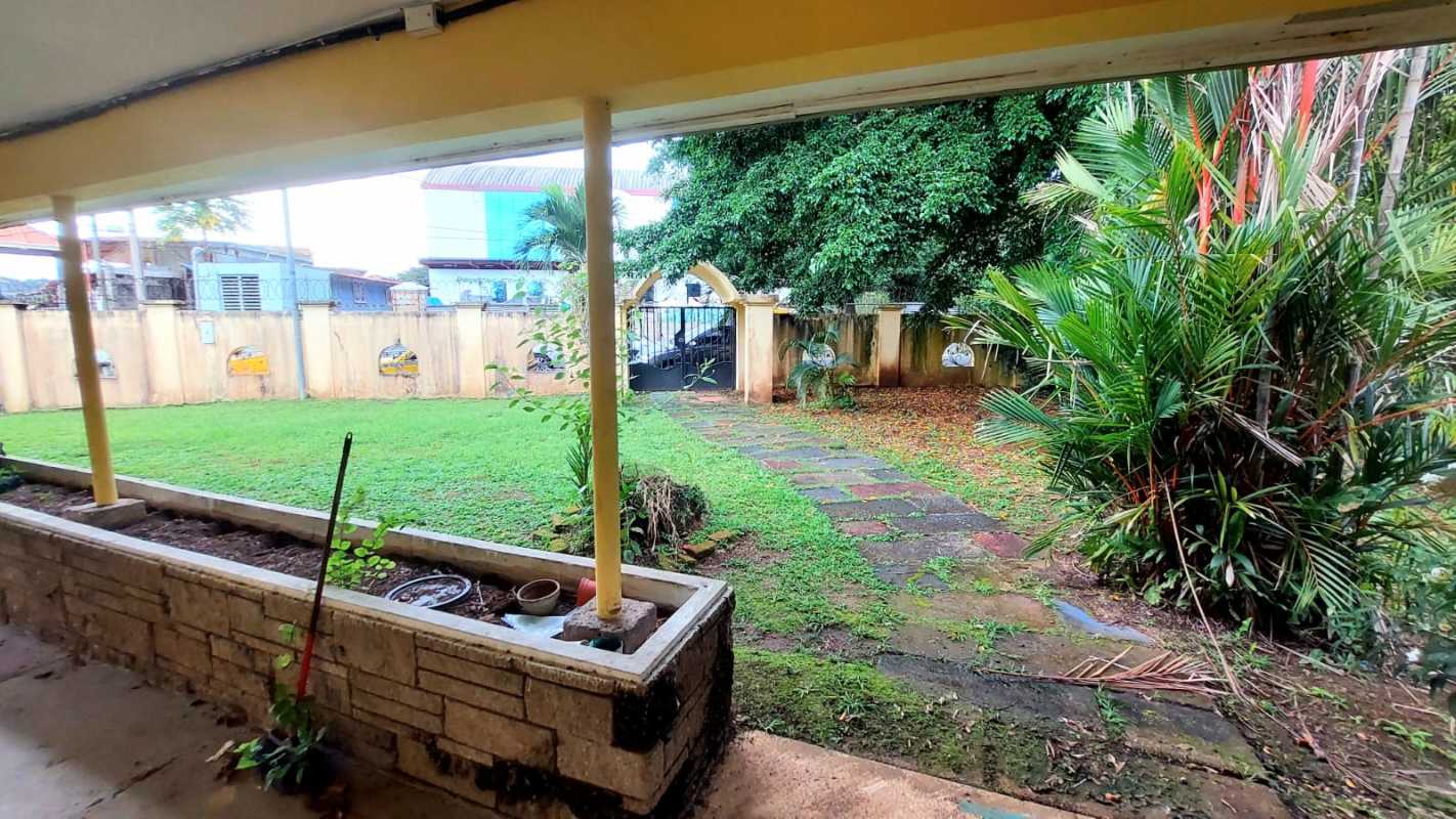 Covered porch with tropical landscaping at house for sale in Panama