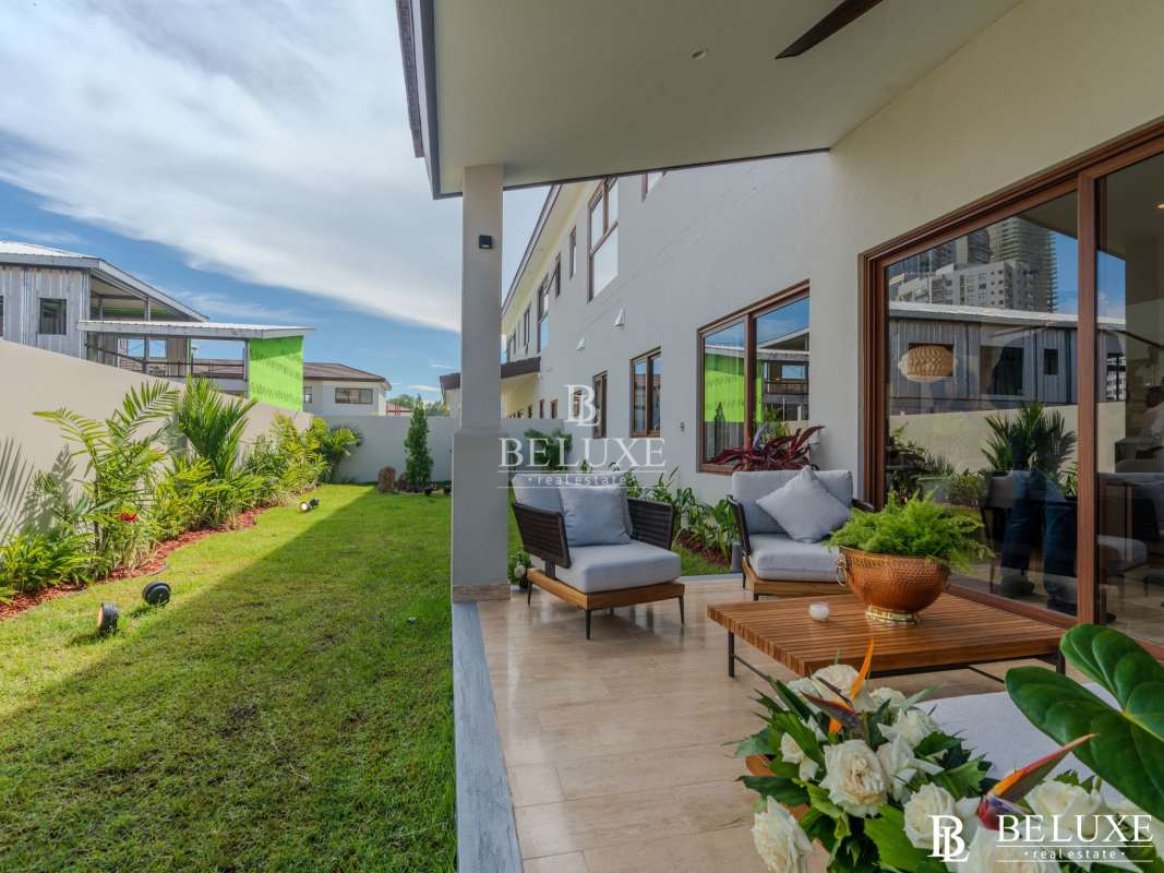 Covered backyard patio with garden view luxury villa PH The Woods Panama City