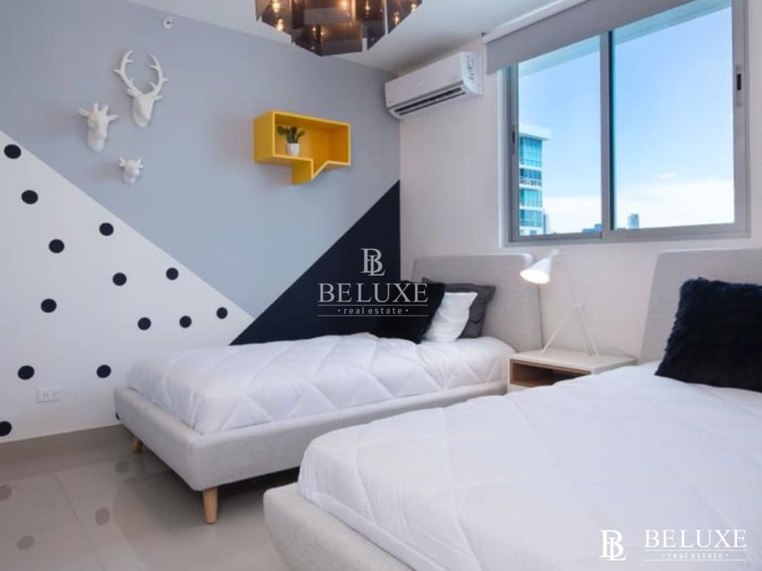 Second bedroom with large window and built-in closet El Cangrejo Panama