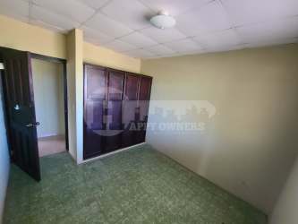 Bedroom with built-in wardrobe tiled floor large window in Jalisco neighborhood Chitré Panama