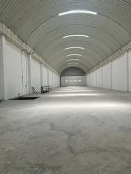 View of mezzanine and ground floor inside Cocosolito warehouse Colón Panama