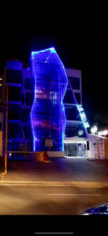 Covered underground parking with concrete floor and ceiling at PH Le Blue Panama City