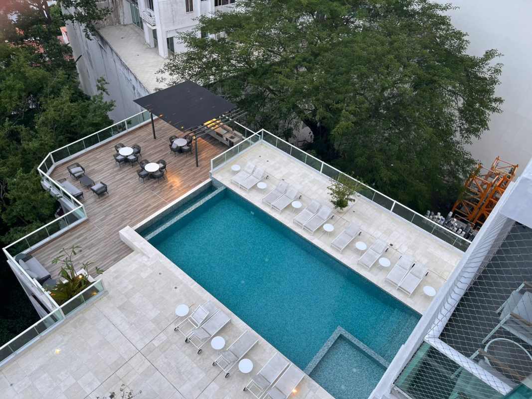 Modern kitchen with island breakfast bar in PH Bonavista apartment Panama City