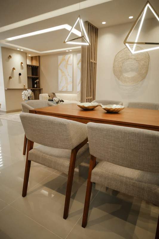 High-rise apartment tower with balconies and outdoor pool area at PH Portofino El Dorado Panama City