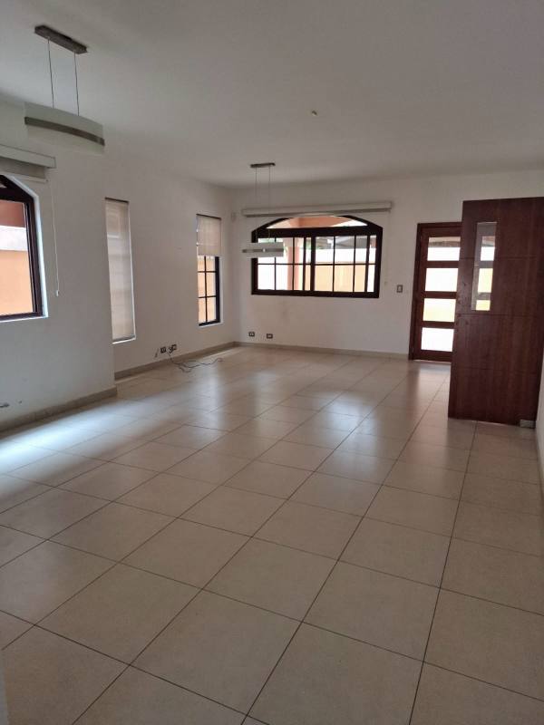 Large living dining area with ceramic floors, windows and access to garden Costa Sur Panama