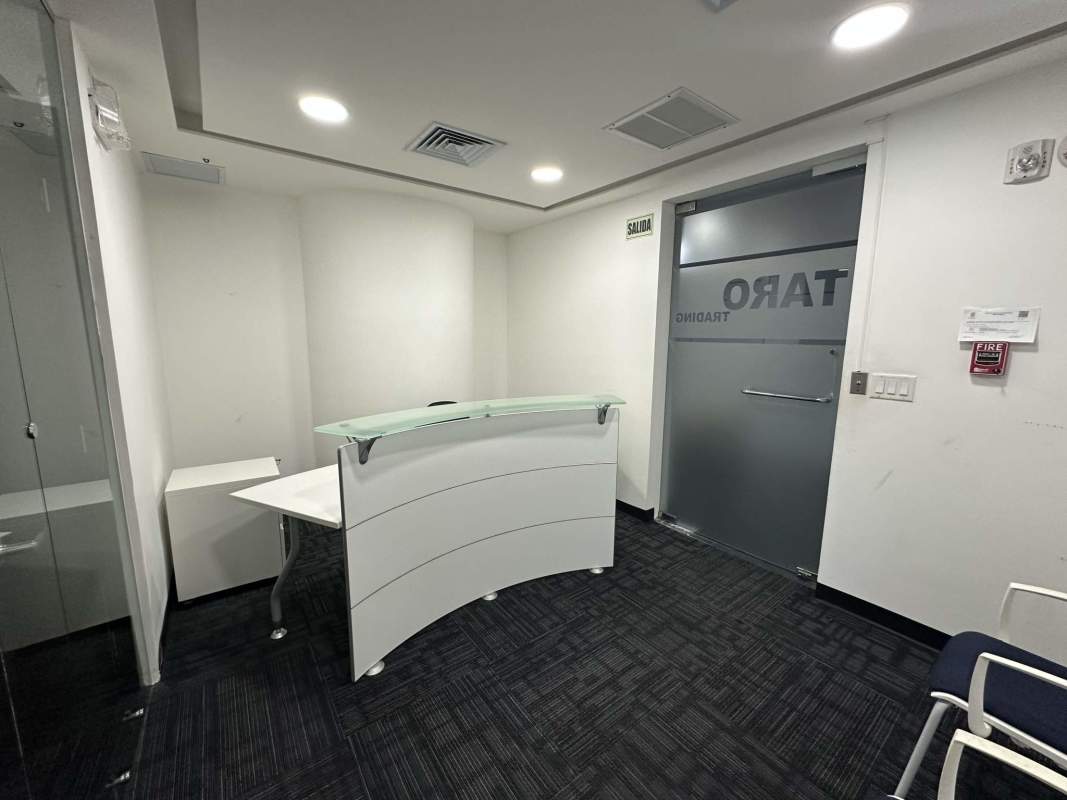 Reception lobby with desk and frosted glass door Punta Pacifica