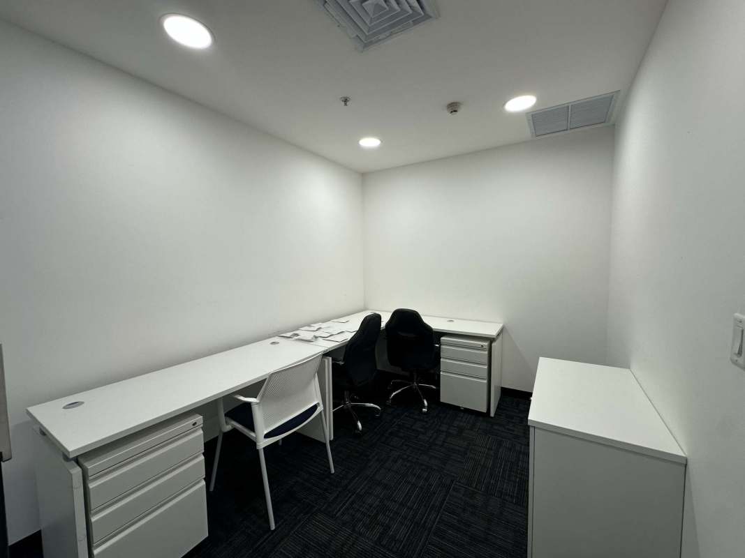 Large open-plan office with city skyline window view Punta Pacifica