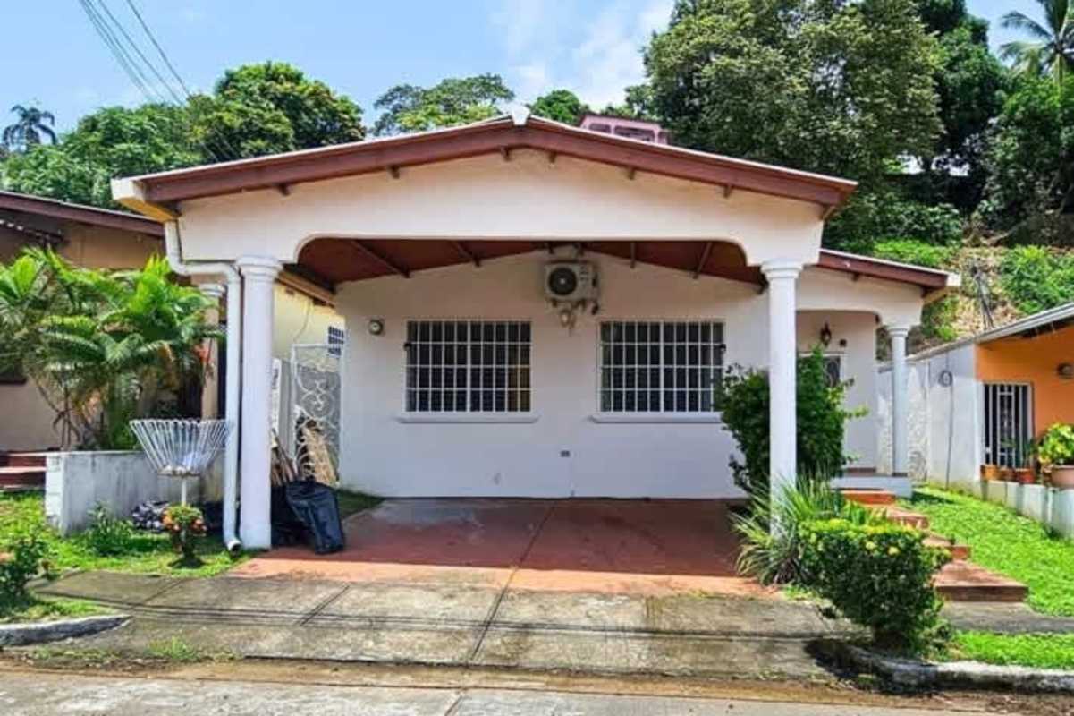 Modern bathroom with glass shower, pedestal sink, tiled walls in Brisas del Occidente Panama