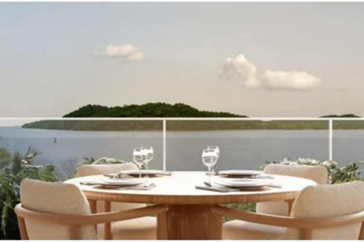 Modern co-working space with wood paneling and bright windows in PH Ocean Reef Amador Panama