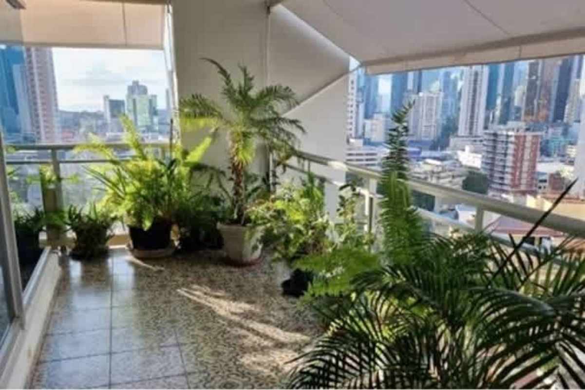 Remodeled apartment living room with balcony access at Vista Tower El Cangrejo Panama