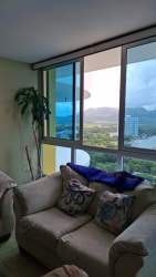 Modern bedroom with glass doors access to balcony overlooking the ocean Playa Serena Penthouse Nueva Gorgona