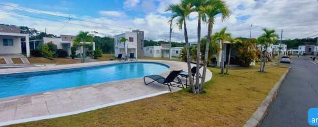 Kitchen with breakfast bar and tile floors inside beach home at The Village Panama