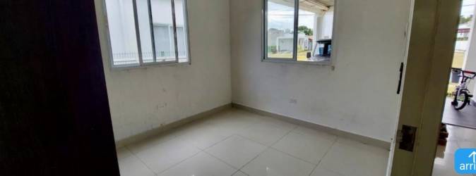 Community pool with lounge area inside The Village beach complex San Carlos