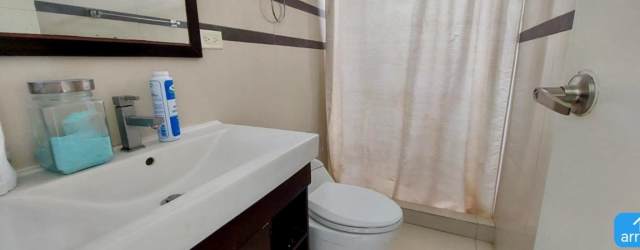 Exterior facade of single-story beach house at The Village in San Carlos Panama