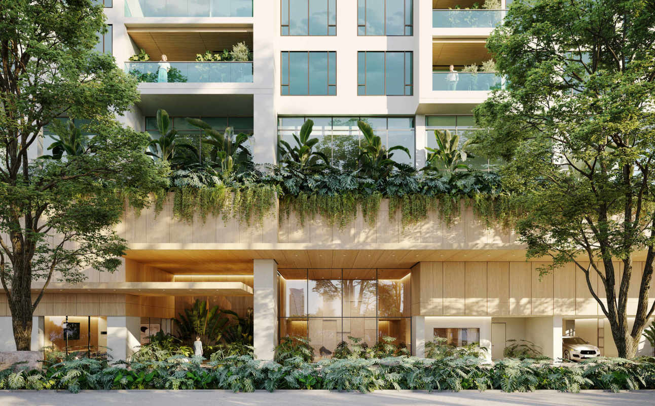 Main entrance with lush landscaping, wood details at PH Blau Costa del Este luxury residence Panama