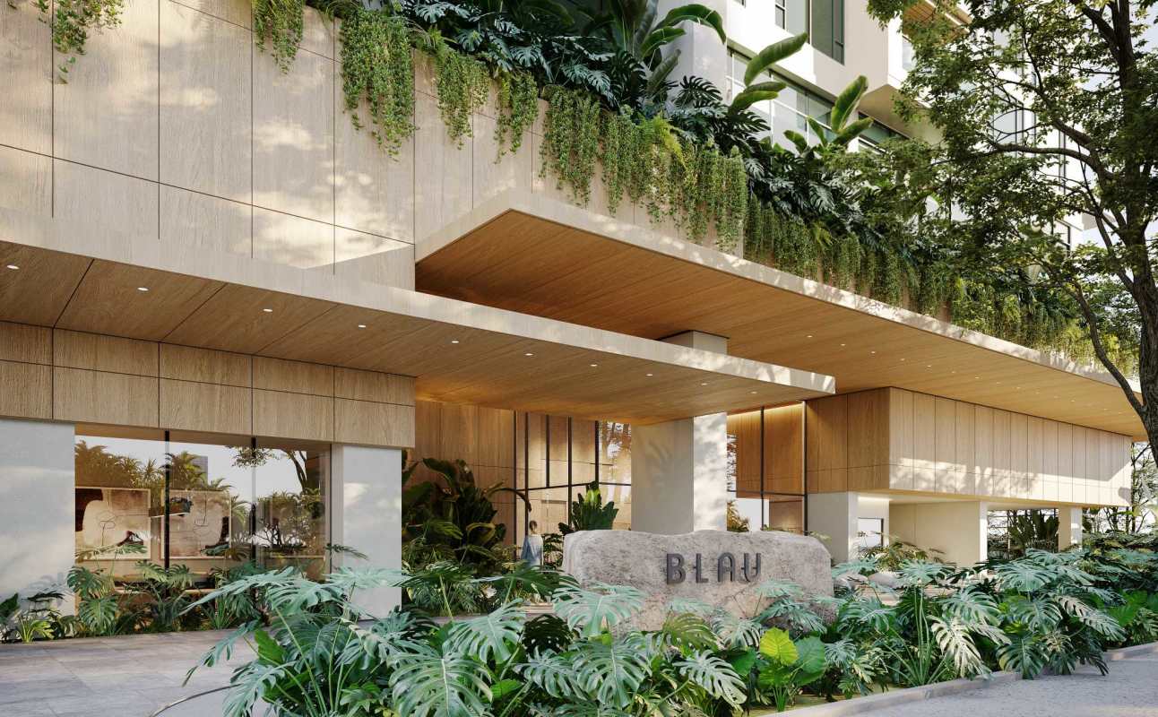 Modern minimalist lobby with natural light, wood decor and garden views at PH Blau Costa del Este