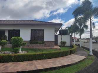 Bedroom includes built-in wardrobe and window security bars Villa Patricia Chiriquí Panama.
