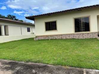 Single-family house with large windows and green yard Doral Villas Panama