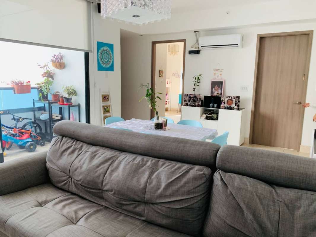 High-rise glass facade of Deluxe Residences tower in Punta Paitilla Panama