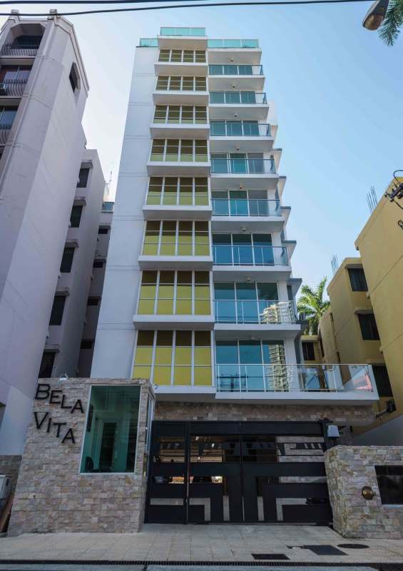 Open modern living area with balcony sliding doors in PH Bela Vita Bella Vista Panama