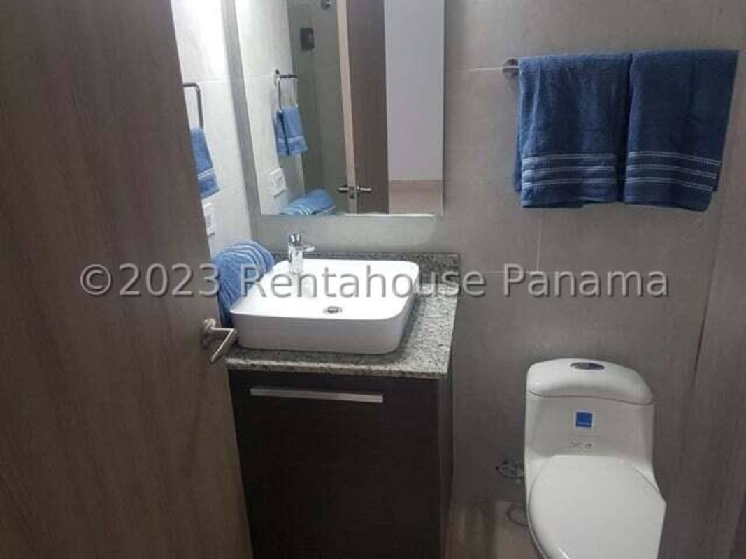 Elegant bathroom featuring granite counters and marble finishes in Pacific Seaside Panama