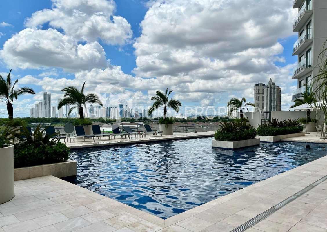 Modern minimalist bedroom with large window and tile flooring at Ocean House apartment Panama
