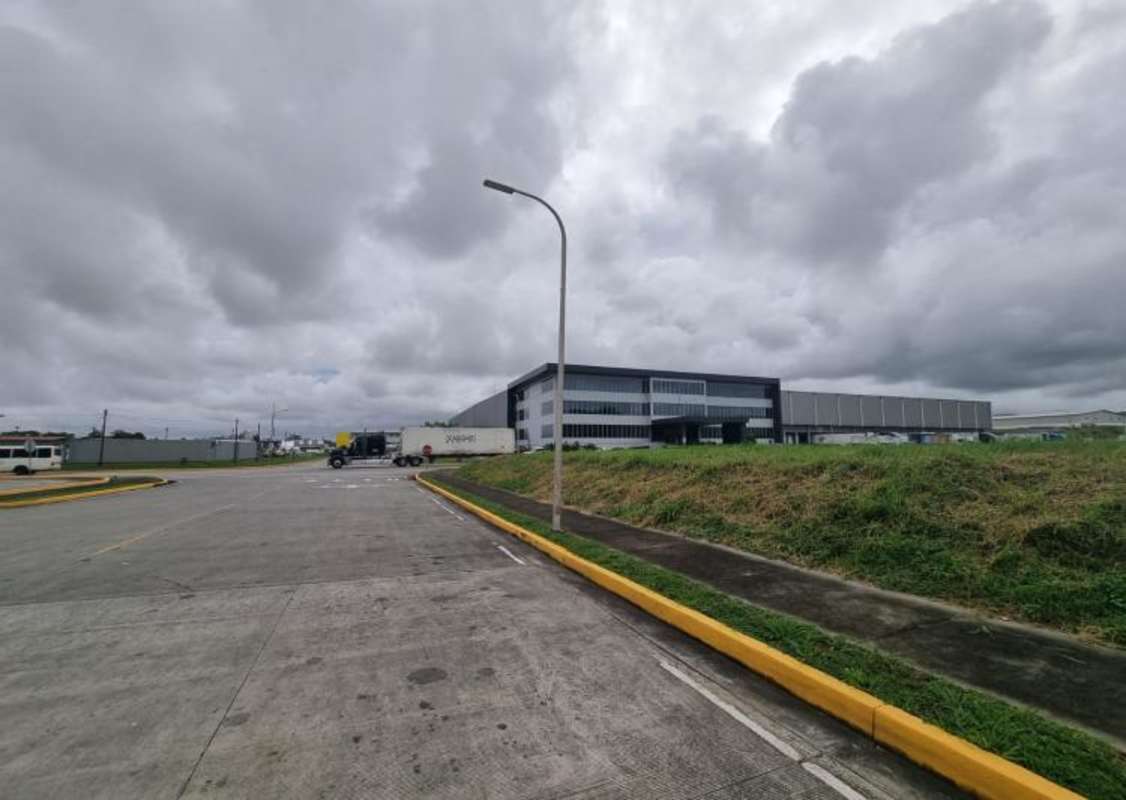 Paved internal road suited for container trucks inside Tocumen Commercial Park Panama