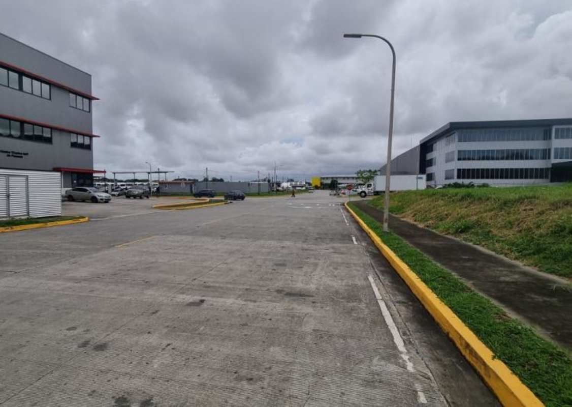 Interior view of Tocumen Commercial Park showing wide truck-compatible roads and modern warehouses