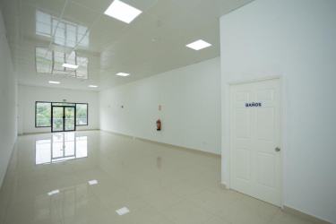 Spacious empty retail or office space with glass doors glossy tiled floor at GDP Commercial Center La Chorrera Panama