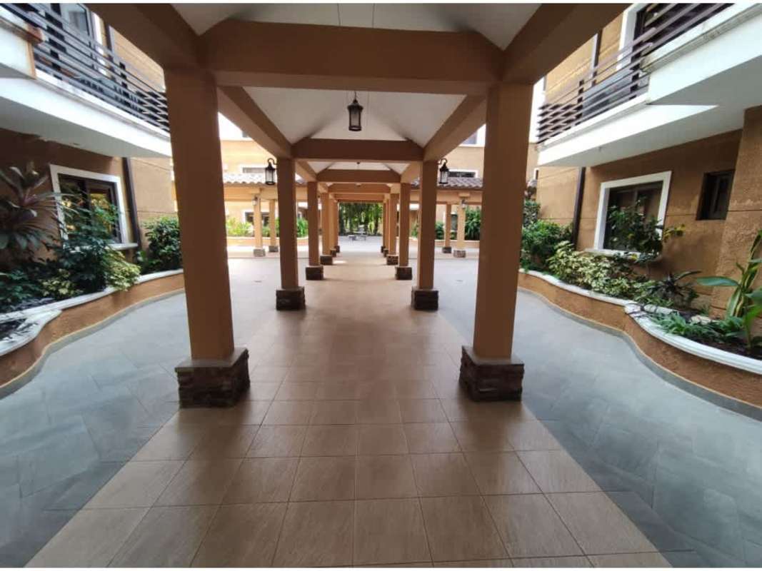 Master suite bedroom with built-in wardrobe AC ceiling fan Embassy Club Panama