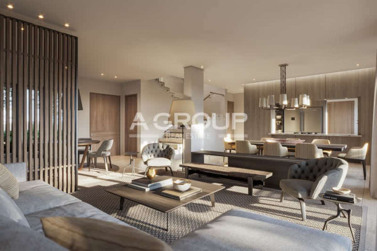 Spacious living area with large windows, wood accents, neutral decor in The Woods Santa María Panama